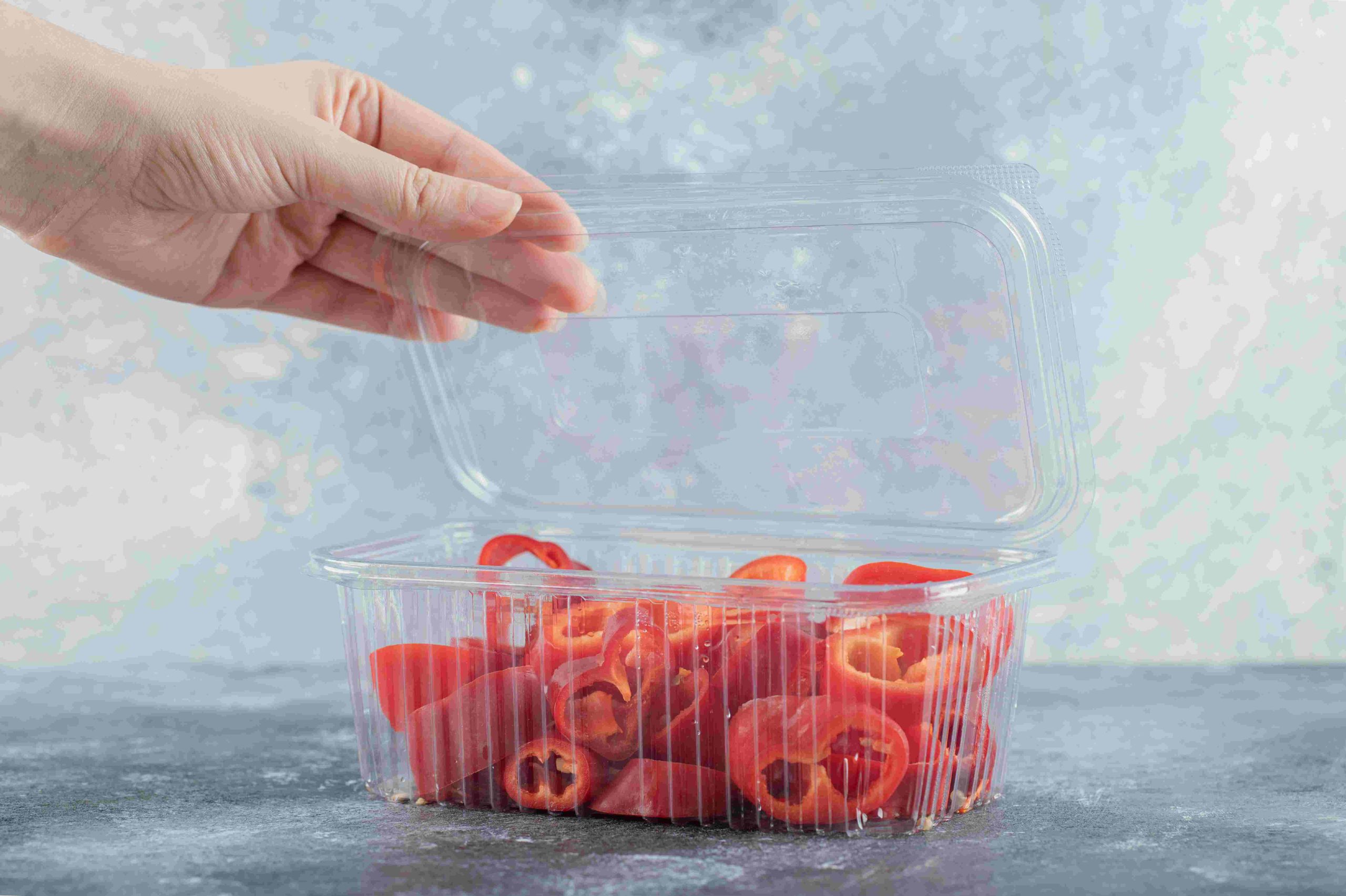 plastic-container-plastic-container-full-with-sliced-red-peppers
